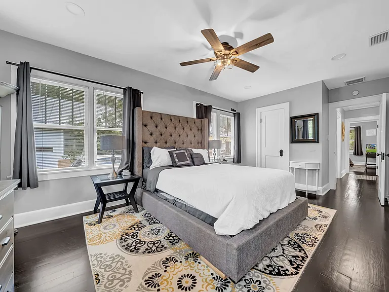 Primary bedroom with walk-in closet and direct access to the backyard