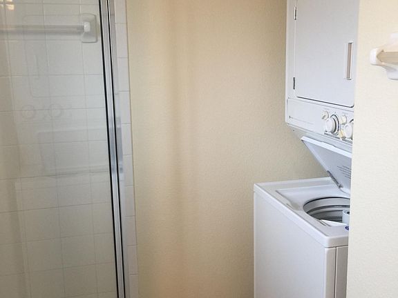 Washer/Dryer located in unit.