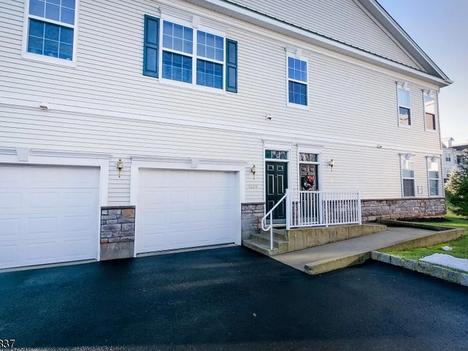2nd floor facing backyard, garage on right.