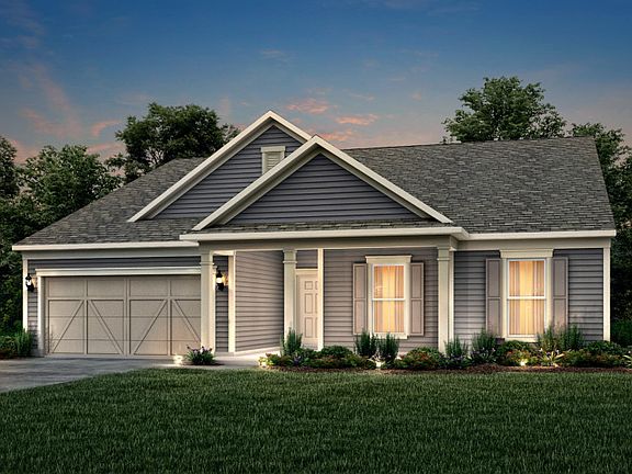 Amberwood Exterior 51 features Hardie Board siding, covered front porch and 2 car garage