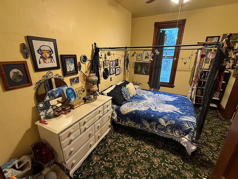 Bedroom 1, off of Living Room. Connects to Bathroom
