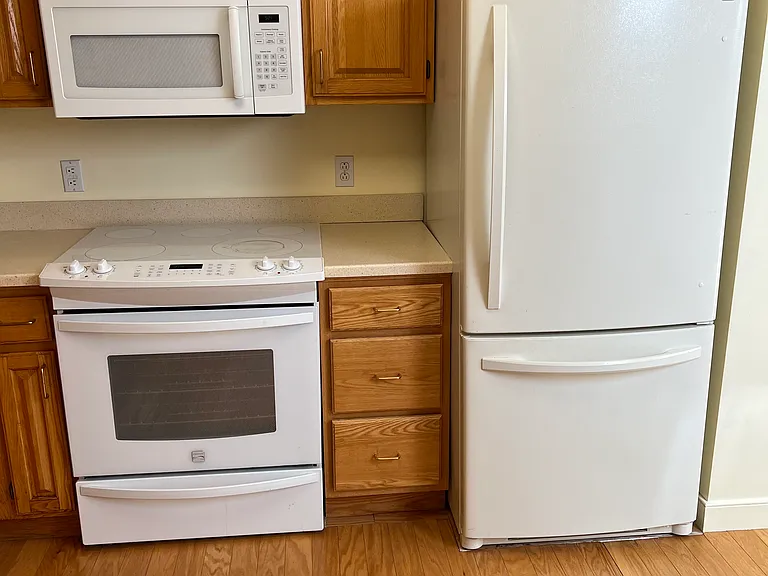 electric stove, fridg, oven, lots of kitchen storage, drawers and cabinets