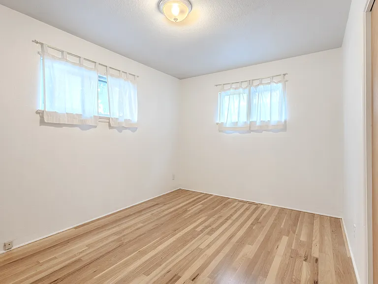 High windows for privacy, spacious bedrooms.