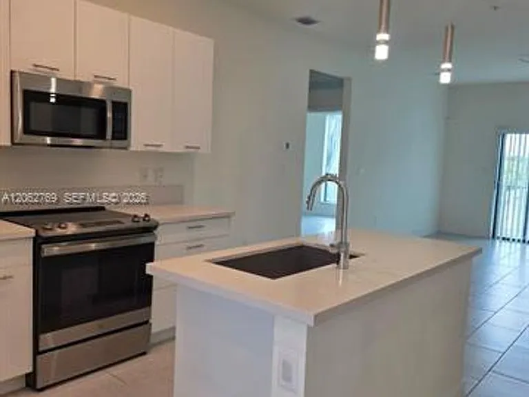 8167 NW 41st St E #409 — Photo 1
