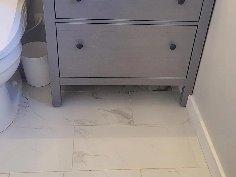 Newer modern vanity in master bath.