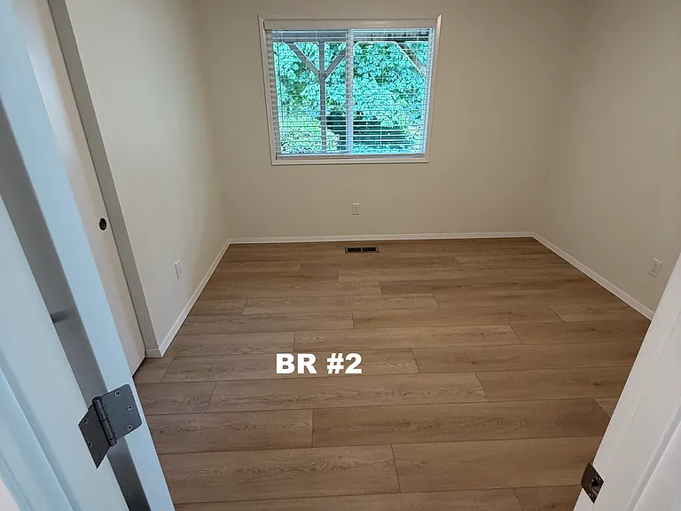 Bottom level is home to bedrooms #2 and #3. Nearly identically sized are good sized rooms with closets.