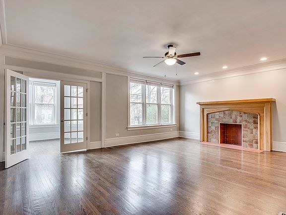 Living Room - Gray Turnover & Hardwood Floor