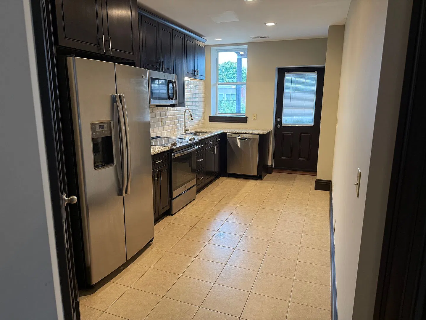 Modern Luxury Meets Historic Charm: Tour This Upscale 2-Bed Retreat Steps From The Grove This Sun... — Photo 3
