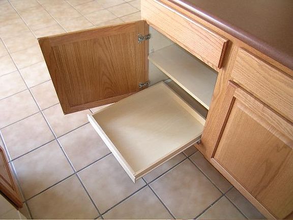 some pull out drawers, tile throughout the house