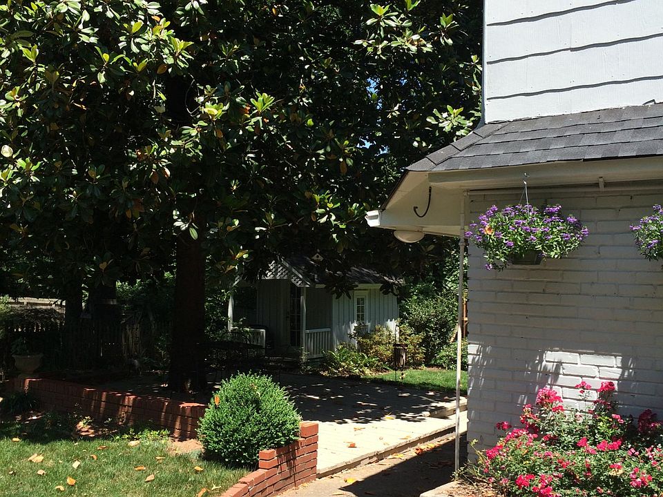 Apartment is located over a 3-car garage. Entrance on to the left side of the garage. Deck under the tree is for tenants use.