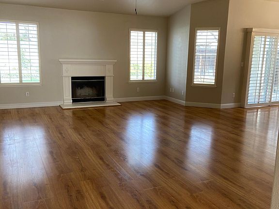 Living room/den. Fireplace is for wood burning.