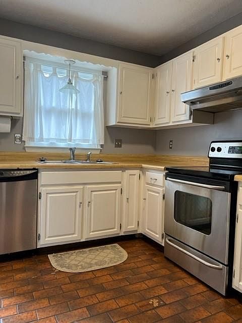 Kitchen with stainless steel appliances