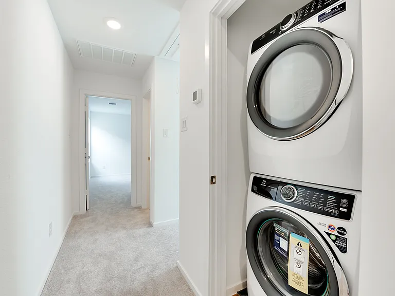 Washer & Dryer conveniently located upstairs with bedrooms