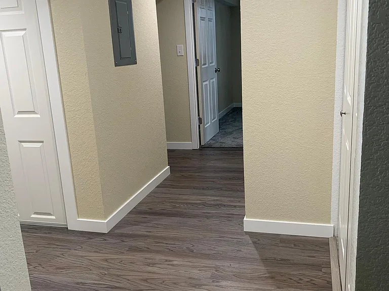 Spacious hall leading to the bedrooms