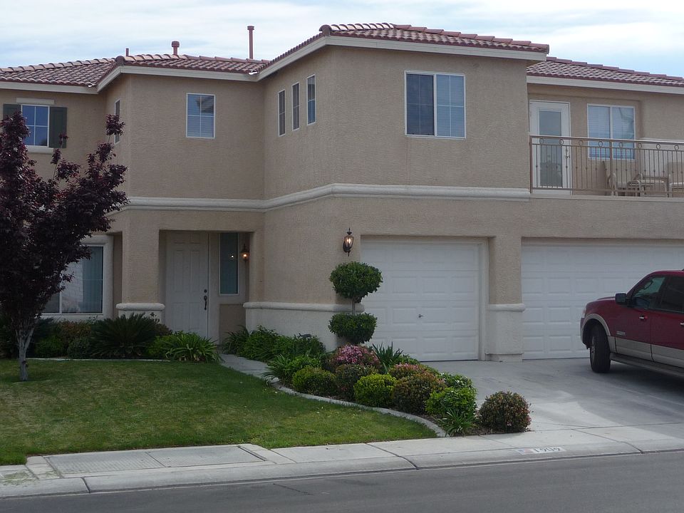 front of house with balcony