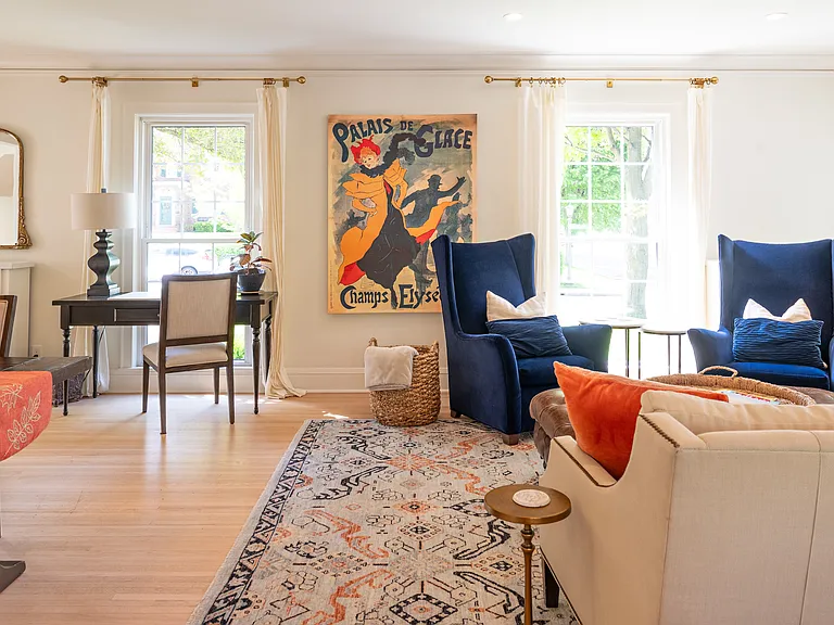 Oversized main level living area has room for seating, dining and office space.