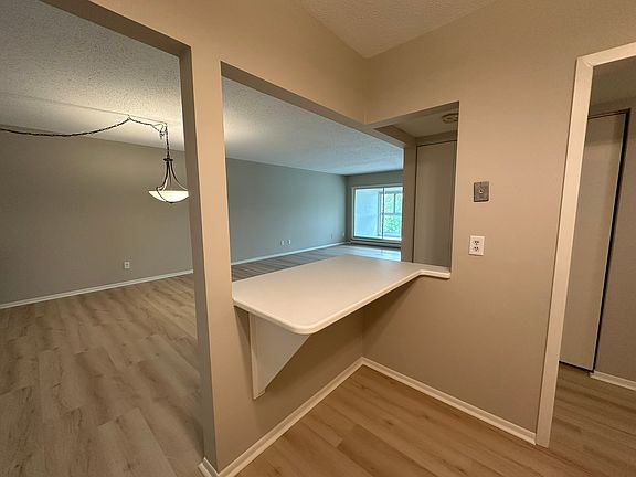 A view from the kitchen to the living room/dining room.