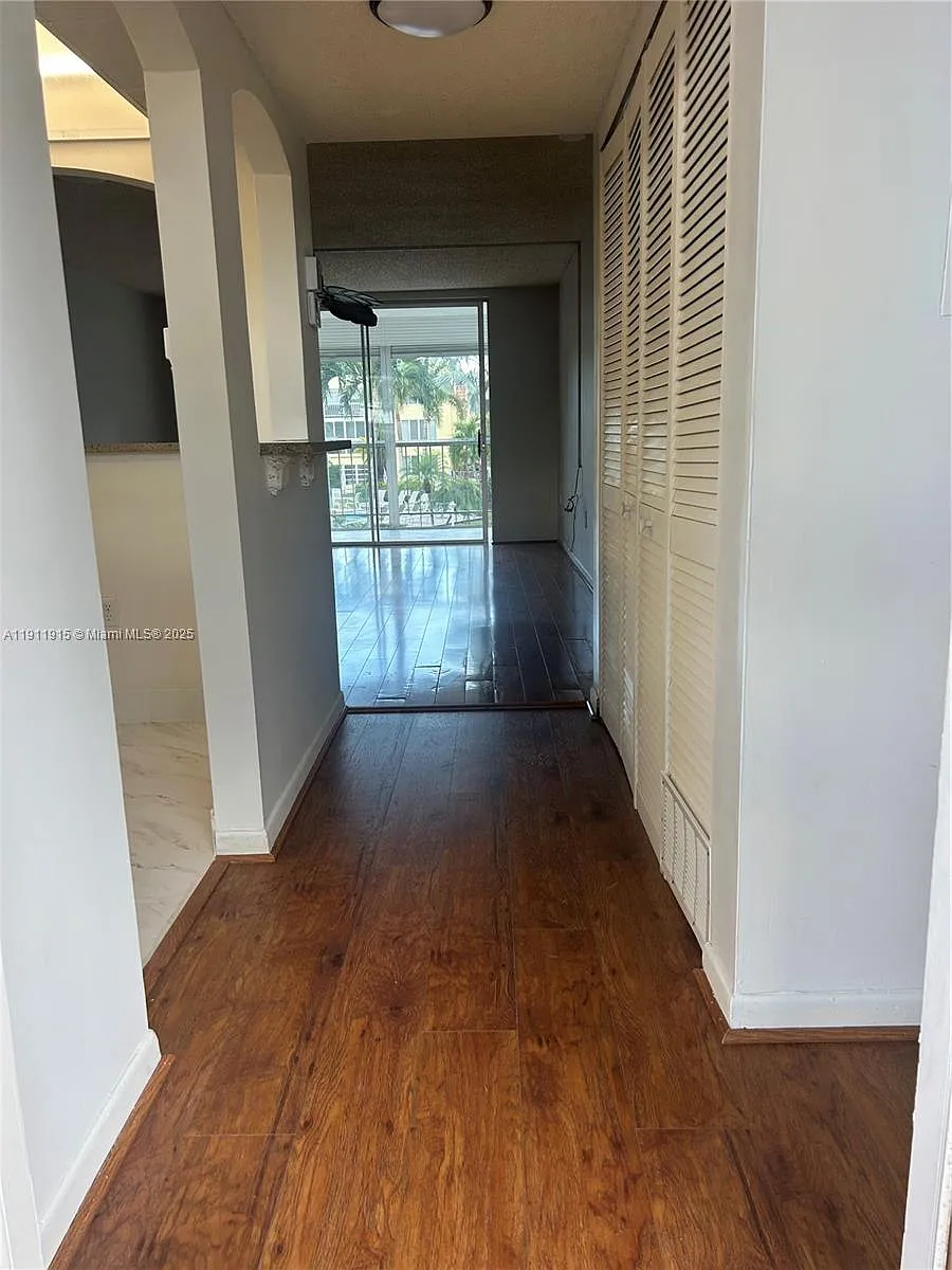 Building Photo - 6750 Royal Palm Blvd #204E