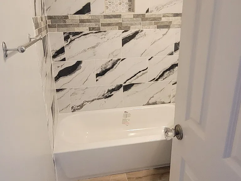 Full bathroom with tiles shower