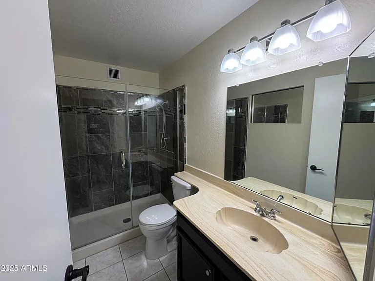 5502 W Frier Dr — Photo 17