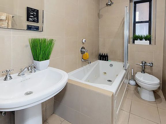 5th image of 3015 Riverdale Ave APT 3H