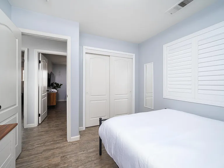 Bedroom 4; queen-sized bed.
