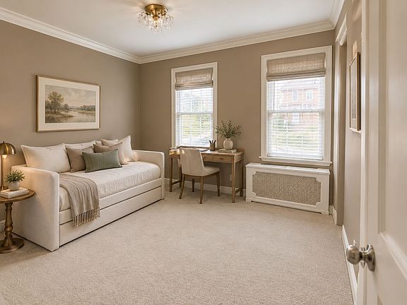 This room was virtually staged. Guest bedroom/office