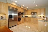 Gorgeous kitchen has granite w/tumbled travertine 