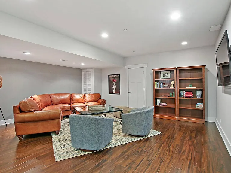 Lower Level; Oversized family room with big coffee table and stocked with games