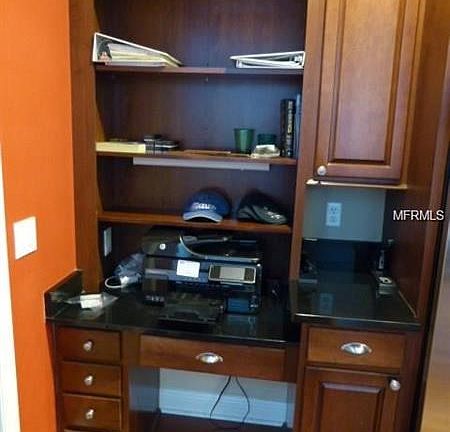 Built in desk area in kitchen.