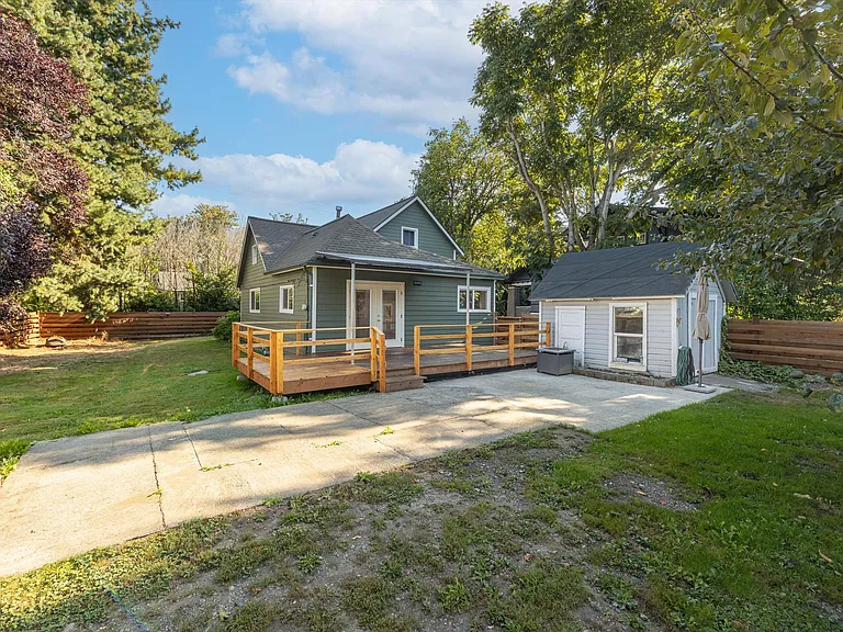 Large back deck with covered awning for year around entertaining.