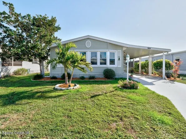 909 Hyacinth Cir, Barefoot Bay, FL 32976
