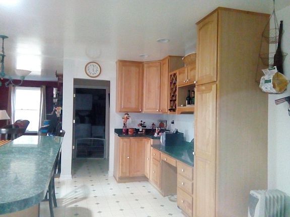 Kitchen leading to Laundry