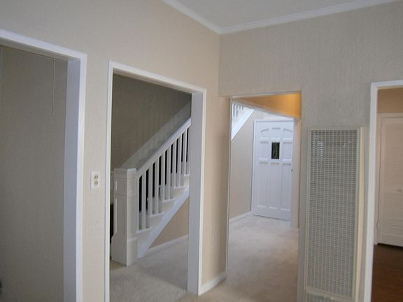 LIVING ROOM LOOKING INTO HALLWAY