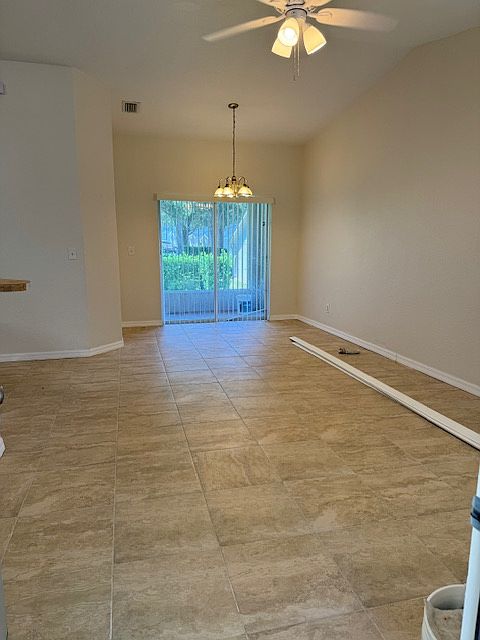 Living area with a screened in back patio