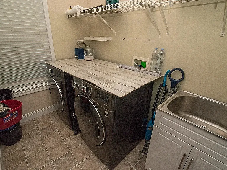 Laundry Room by Kitchen and Garage