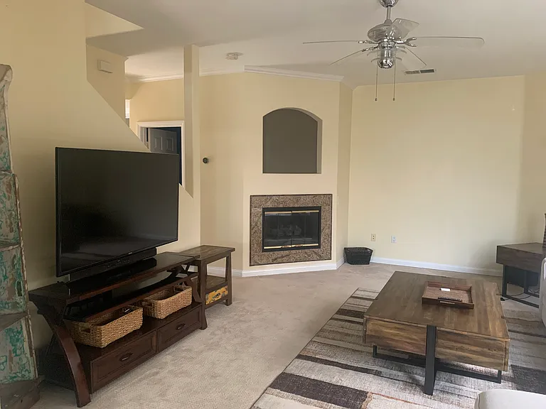 Spacious Living Room with Fire Place