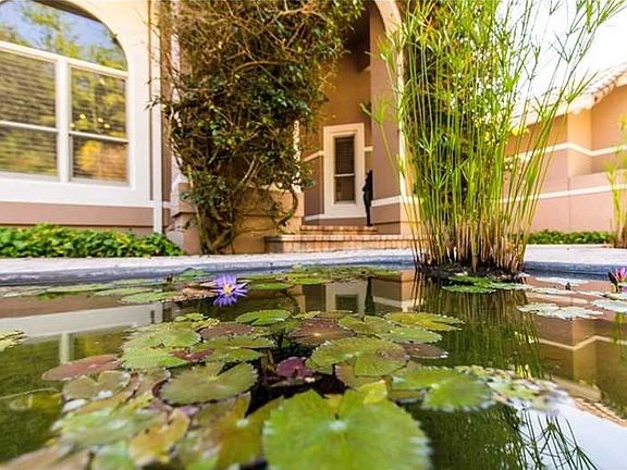 Coral Gables estate nestled on charming Old Cutler Rd.