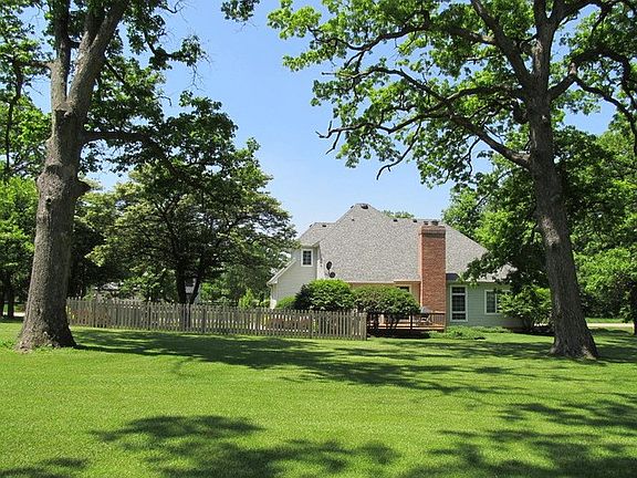 Mature trees and fenced-in back yard