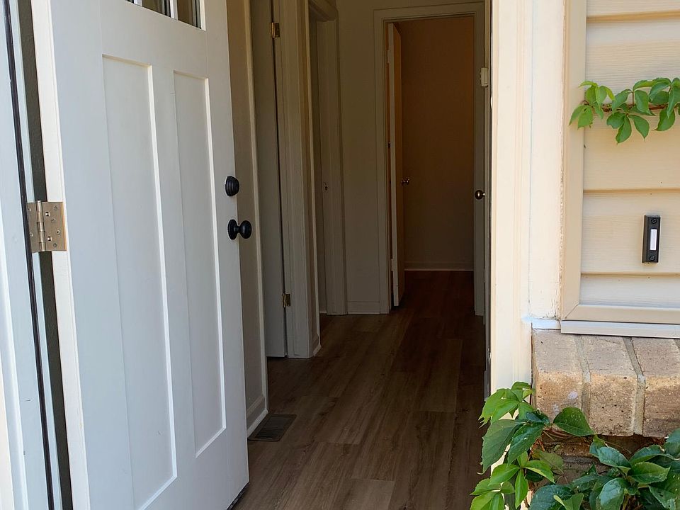 West Entry to Mid-Level Bedrooms & Bath; new flooring.