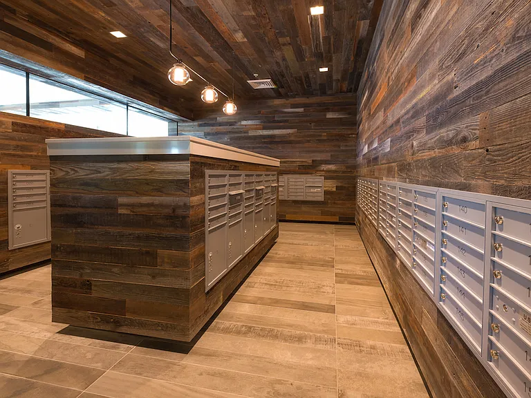 Mailroom with rustic wood accents and organized layout.