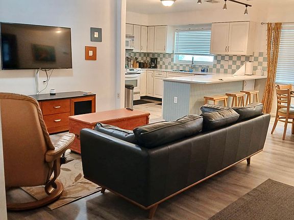 Open floor plan-living room, dining room, and kitchen without walls.