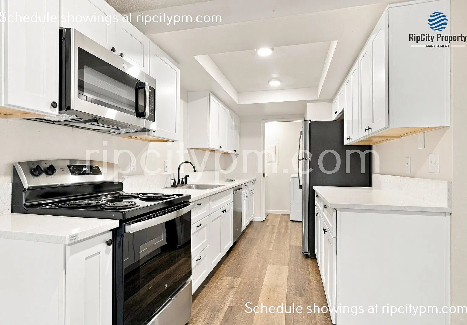 Fully Remodeled 3-Bedroom Duplex with Primary Suite, Huge Fenced Yard & Garage — Photo 1