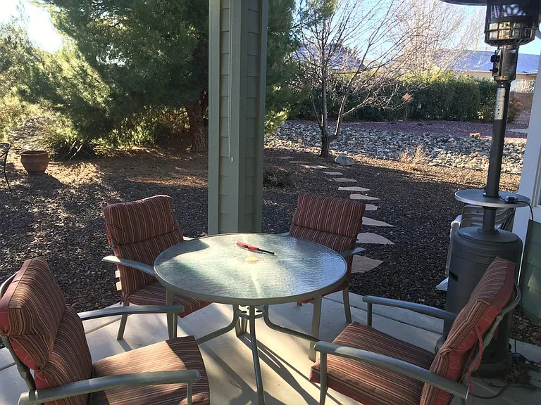 Very nice private backyard with fruit trees and pine tree.