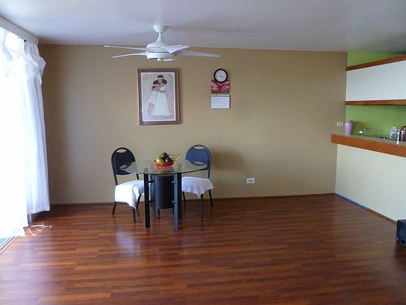 Dining area, hardwood flooring.