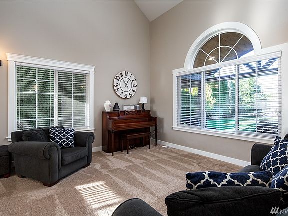 Large picture windows allow lots of natural light into the space.