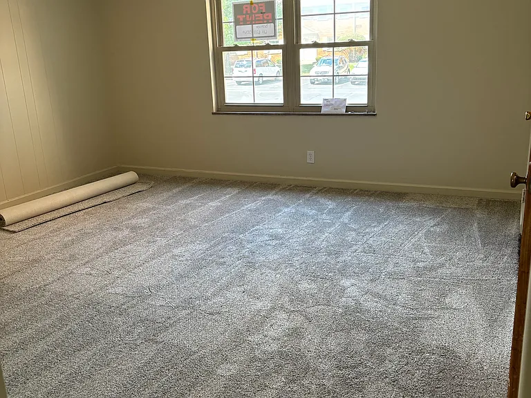 Living space with coat closet.