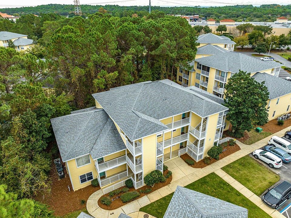 Balcony is on the back side of building facing large nature area.