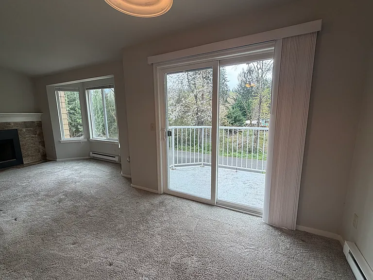 large patio on quiet corner. listen to the creek and view the hills and tree tops