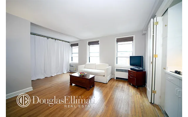 Sold by Douglas Elliman | media 13